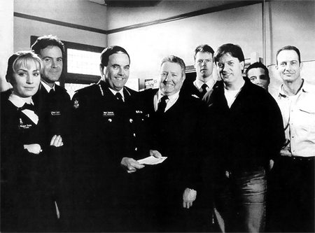 Real policemen pose with the cast of Blue Heelers